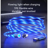 a blue light charging cable with a laptop in the background