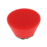 a red sponge on a white background