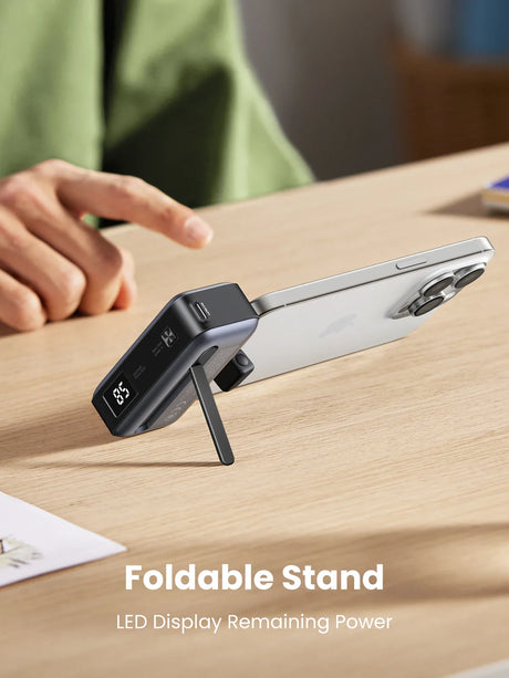 Foldable smartphone stand with an LED display showing remaining battery power.