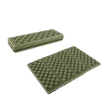 a pair of green plastic floor tiles