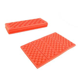 a pair of red plastic floor tiles