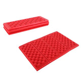 a pair of red foam mats