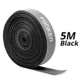 a roll of black tape with the words’5m ’
