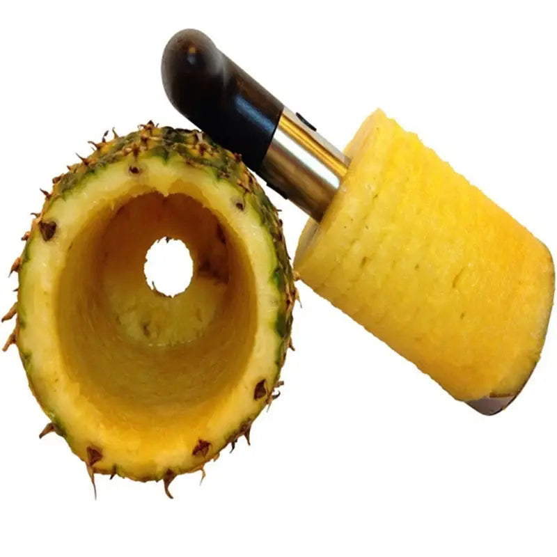 a pineapple cut in half with a knife