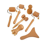 a close up of a bunch of wooden tools on a white surface