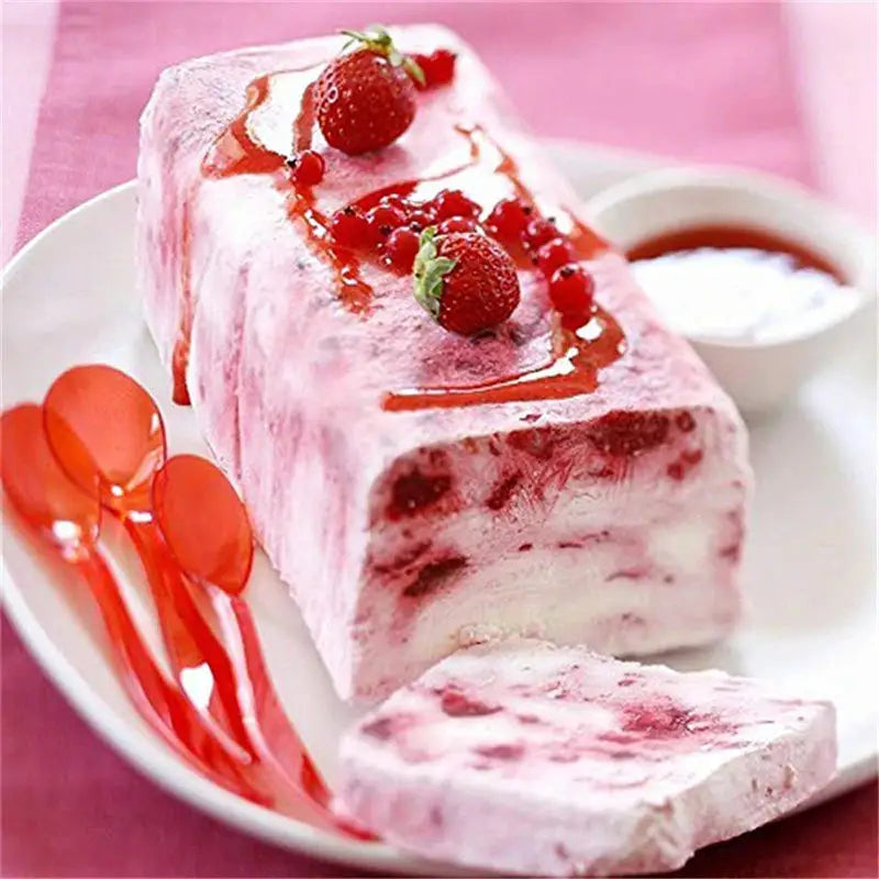 a piece of cake with strawberries and strawberries on top