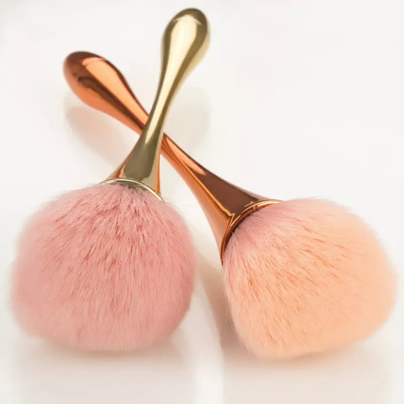 two blush makeup brushes on a white background