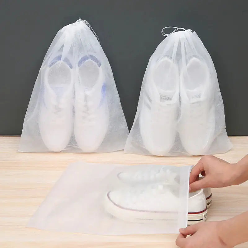 a person putting a shoe in a bag