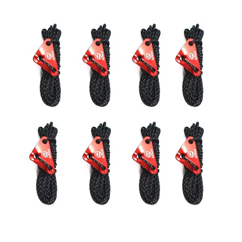 a set of black braid hair clips with a red bow