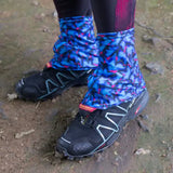 a person wearing a pair of hiking shoes