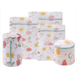 a set of four storage bags with a pattern of clouds and suns