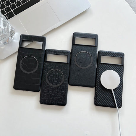 Four black protective cases for portable electronic devices, likely smartphones or music players, with visible display windows and circular control areas.