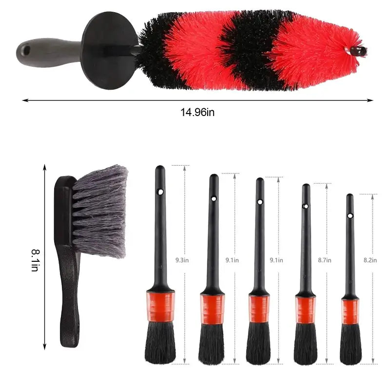 a close up of a set of brushes with a red and black brush
