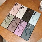 four different colored cases on a table