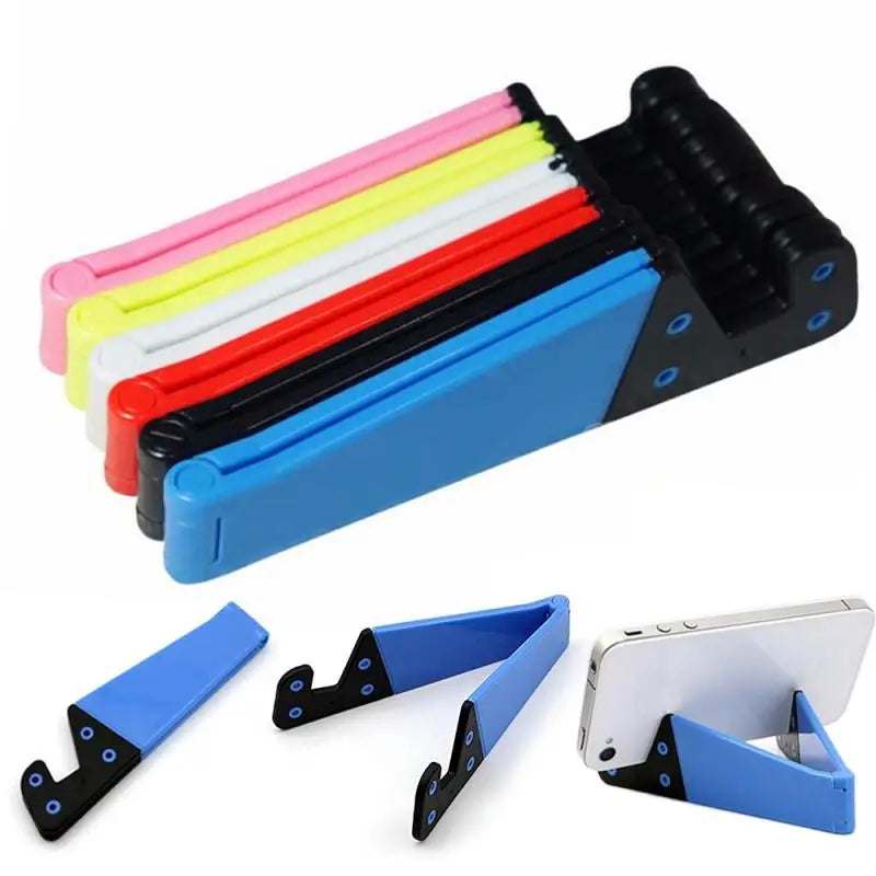 a set of four different colored plastic clips