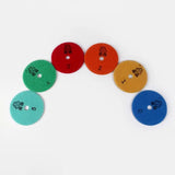 a set of four colored discs with the words’i love you ’
