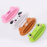 four different colored plastic animal shaped clips