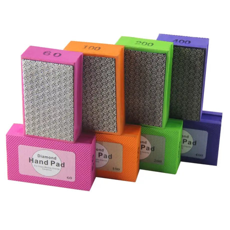 a set of four colorful boxes with different designs