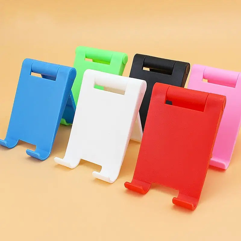 a set of four colorful plastic phone cases