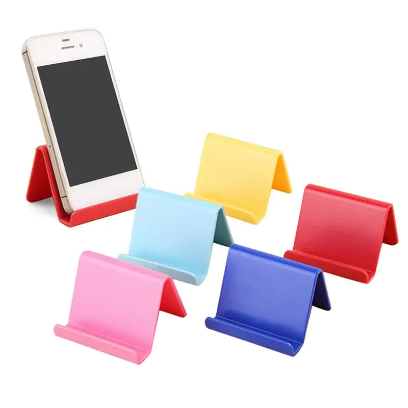 a cell phone holder with four different colors