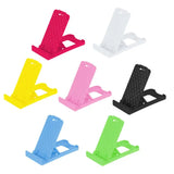 a set of four colorful plastic phone stand