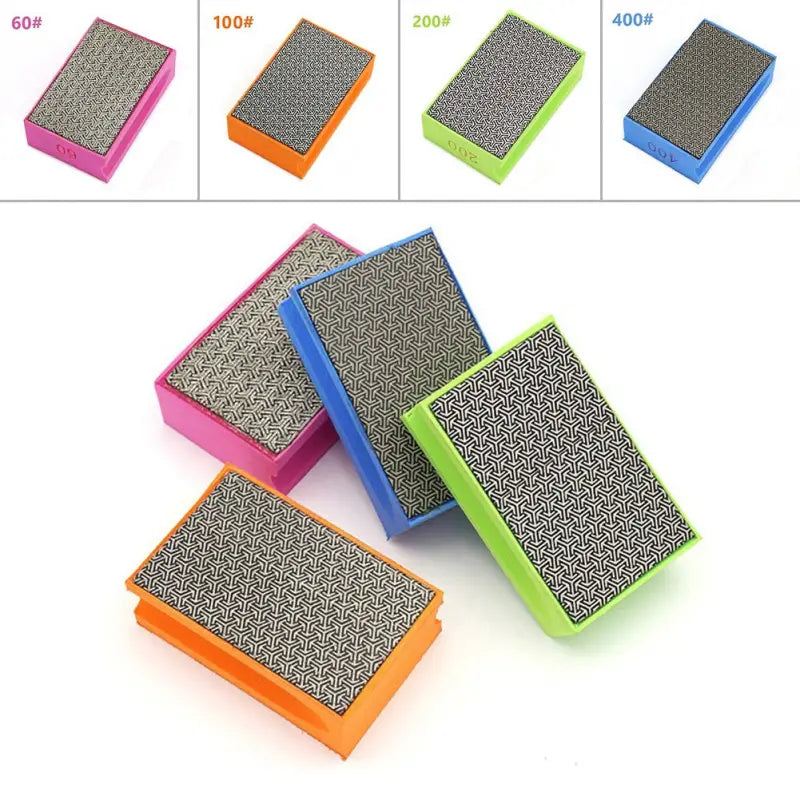 four different colors of plastic boxes with different patterns
