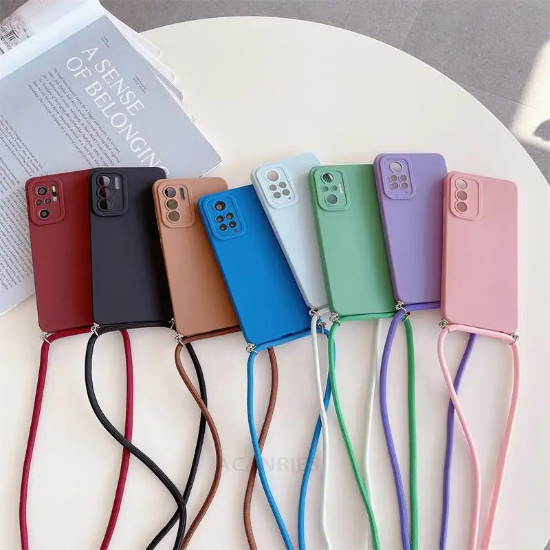 a set of four phone cases with a strap