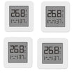 Four digital therms on a white background