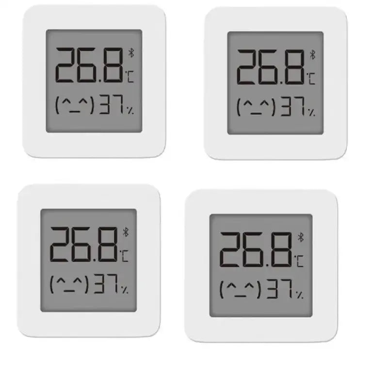 Four digital therms on a white background