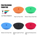 a set of four different foaming foam pads with different colors