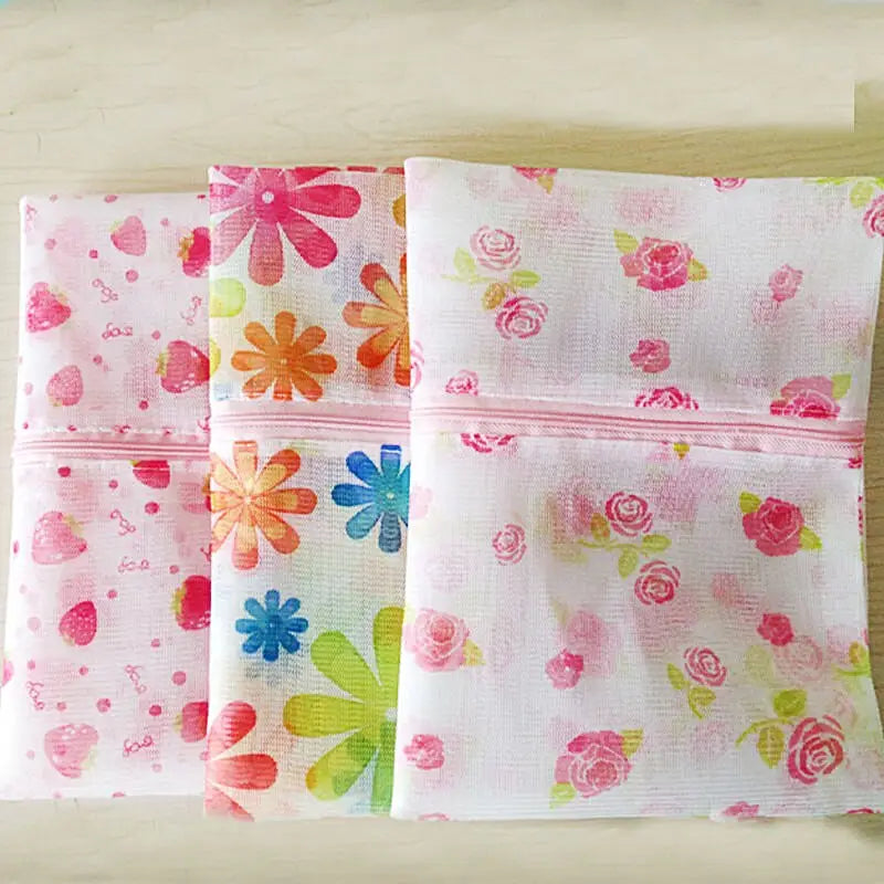 three napkins with different designs on them