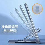 there are four pens and a laptop on a stand with a chinese text