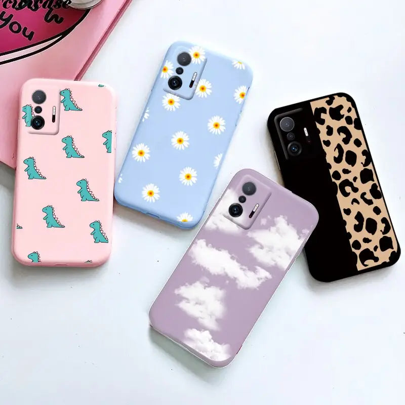 four phone cases with different designs