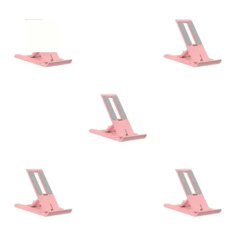 a set of pink metal stand for a laptop