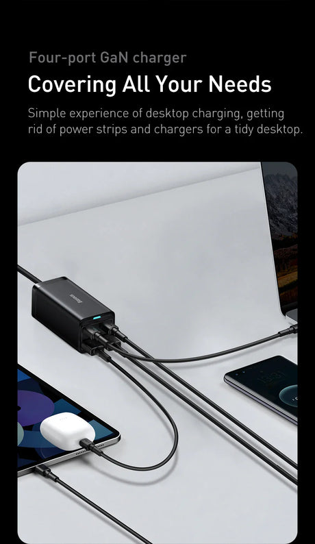 Four-port GaN charger connected to multiple devices via cables.