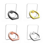 four different metal rings on a white background