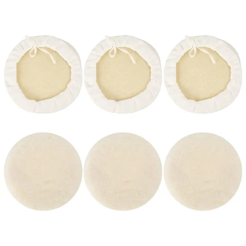 a set of four round felt pads