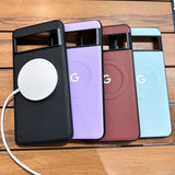 Four smartphone cases in different colors (black, purple, burgundy, and light blue) with a circular cutout and Google ’G’ logo.