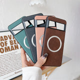 Four smartphone cases in different colors with circular cutouts for the camera.