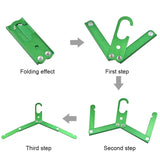 the four parts of the green plastic mounting system