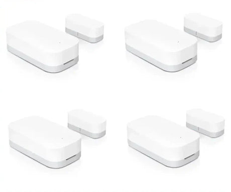 Four different views of a door window sensor
