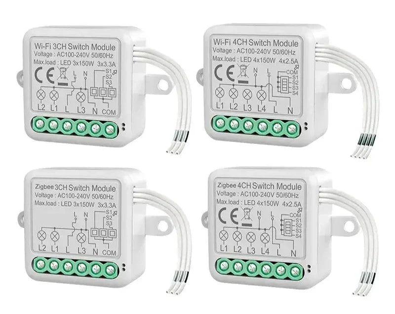 Four white electronic switches with green buttons and wires