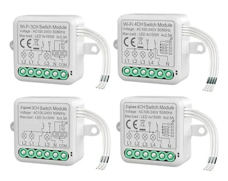 Four white electronic switches with green buttons and wires
