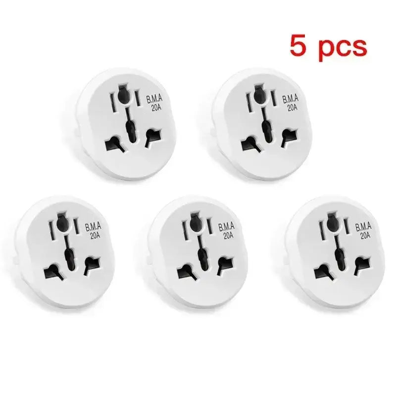 four white plugs with black and white numbers on them