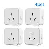 four white square plugs with black wires and a white background