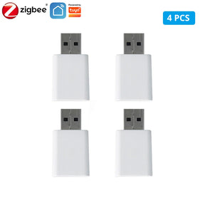 Four white USB adapters.