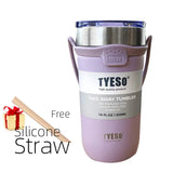 there is a purple and silver cup with a straw in it