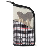 a black and white houndskinn wallet with a red and white checkered pattern