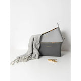 the grey leather clutch bag with a gold handle