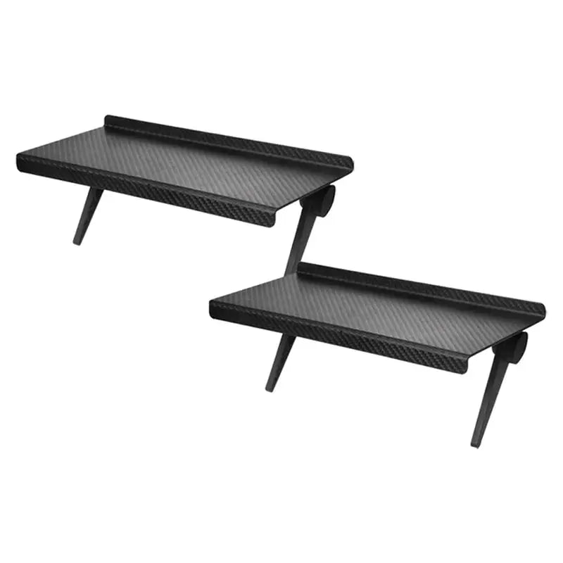 two black trays with a black handle and legs